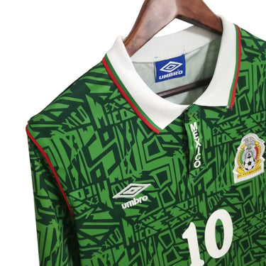 KODAA SPORT Mexico 1994 retro home football shirt. Green with repeating Mexico pattern, white collar with red and green trim, Umbro logo, and number 10.