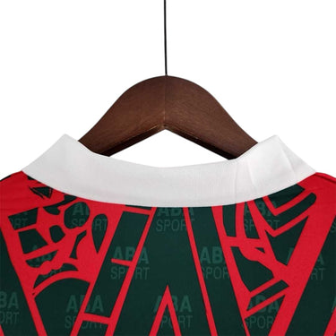 KODAA SPORT Mexico 1997 retro football jersey with a red and green geometric pattern and white collar.