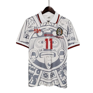 KODAA SPORT Mexico 1998 retro football jersey with Aztec-inspired print, white with grey and red accents, featuring the number 11.