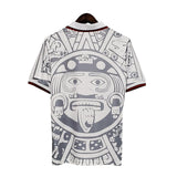 KODAA SPORT Mexico 1998 retro football jersey with Aztec sun stone graphic, white with grey and maroon trim.