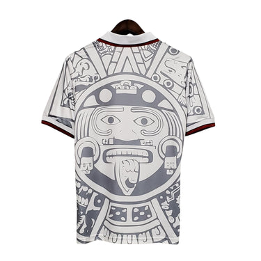 KODAA SPORT Mexico 1998 retro football jersey with Aztec sun stone graphic, white with grey and maroon trim.