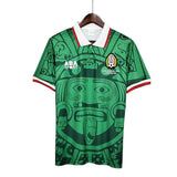 KODAA SPORT Mexico 1998 retro home football shirt with Aztec-inspired print, white collar and red/white trim on sleeves.