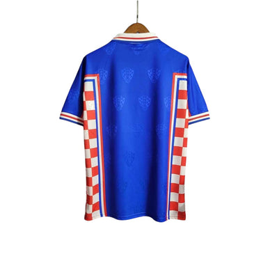 KODAA SPORTS Croatia 1998 retro home football shirt. Blue with red and white checkered side panels and collar trim.