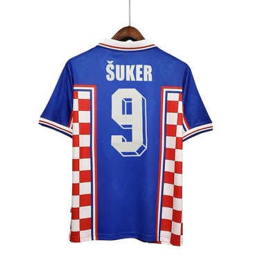 KODAA SPORTS Croatia 1998 retro home football shirt with Suker 9 on the back. Blue with red and white checkered sides.
