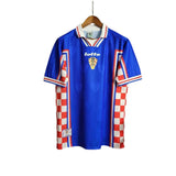 KODAA SPORTS Croatia 1998 retro home football shirt. Blue shirt with red and white checkered sides and sleeve trim. Lotto logo and Croatia crest.
