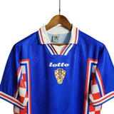 KODAA SPORTS Croatia 1998 retro home football shirt. Blue shirt with white collar and red/white checkered sleeves. Lotto logo and Croatia crest.