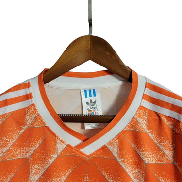 KODAA SPORTS Netherlands 1988 retro home football jersey. Orange with white trim and Adidas branding.