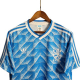 KODAA SPORTS retro Netherlands 1988 away football shirt with blue and white geometric pattern, white collar and sleeve stripes.